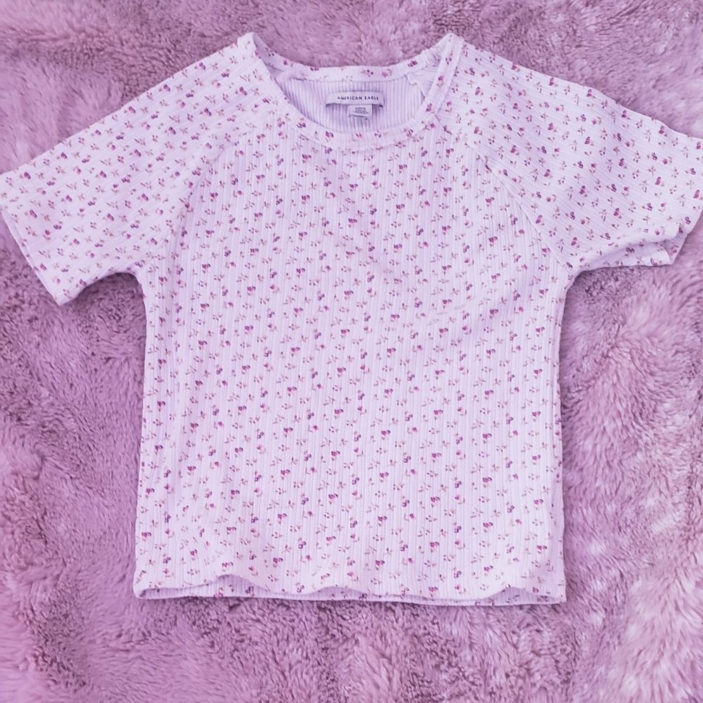 An American eagle white shirt with pink flowers